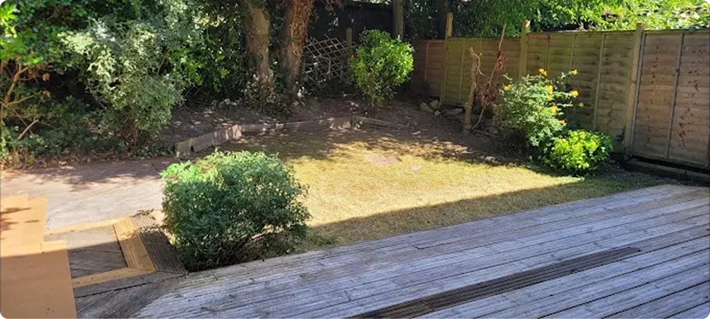 Manicured lawn with decking